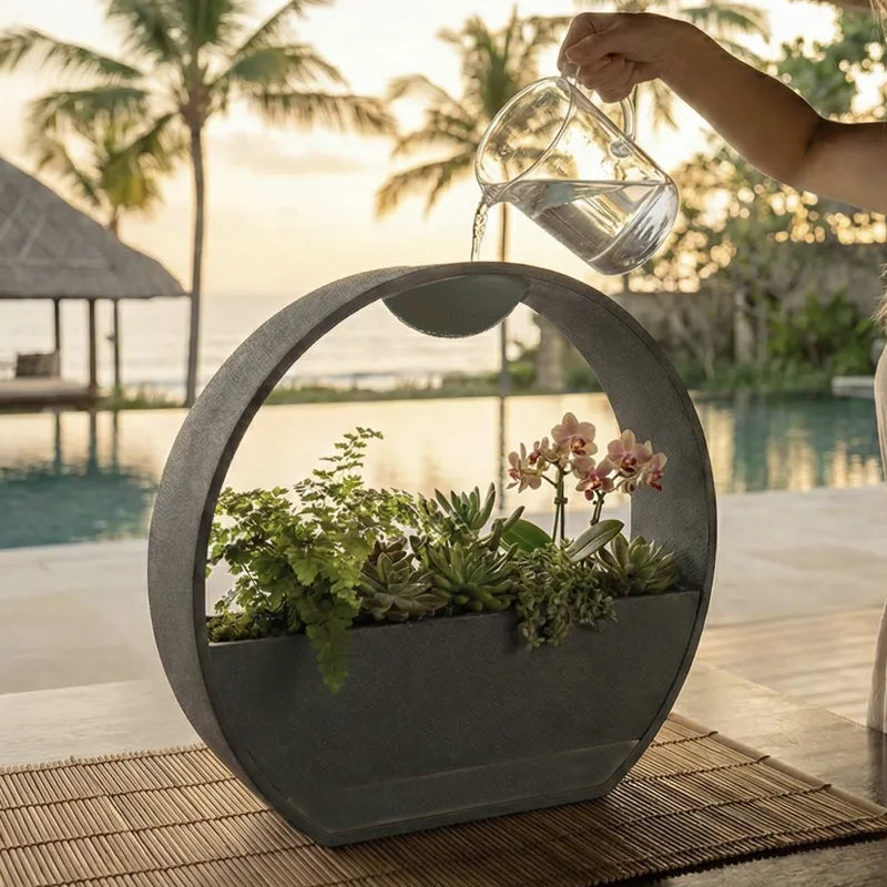 3D-printed stone-textured self-watering flower pot