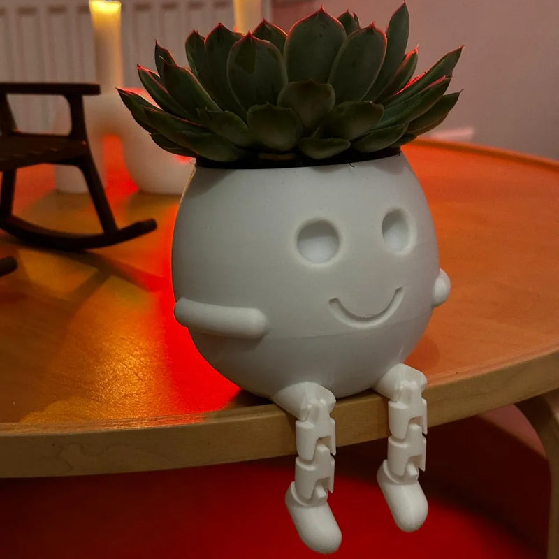 3D printed rocking planter, perfect as a desktop decoration, bookshelf embellishment, or gift. White.